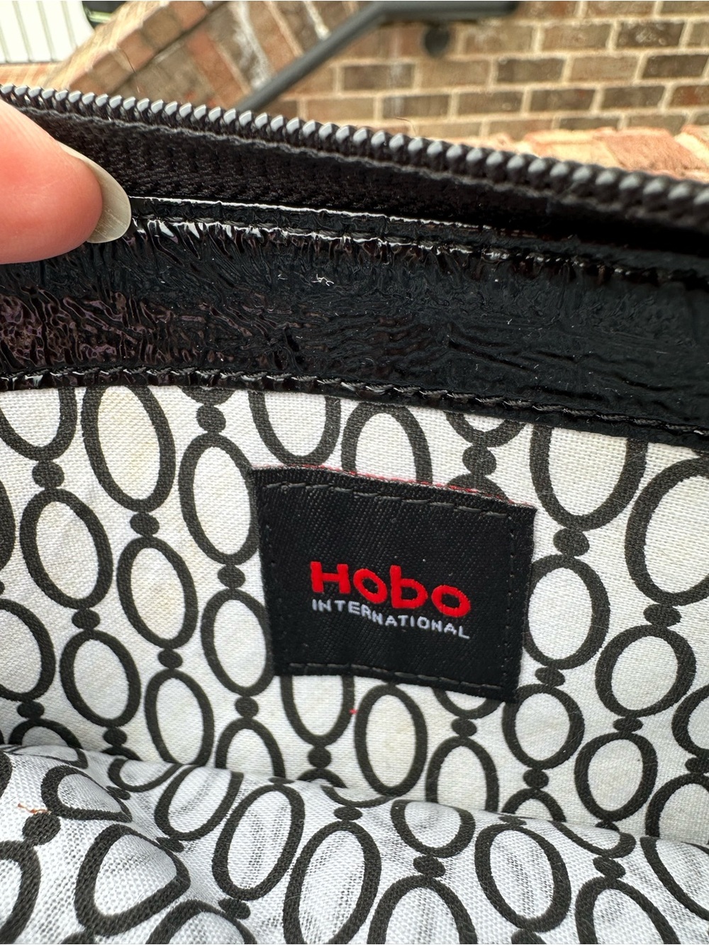 HOBO Black and White Women’s Paten Leather  Wallet